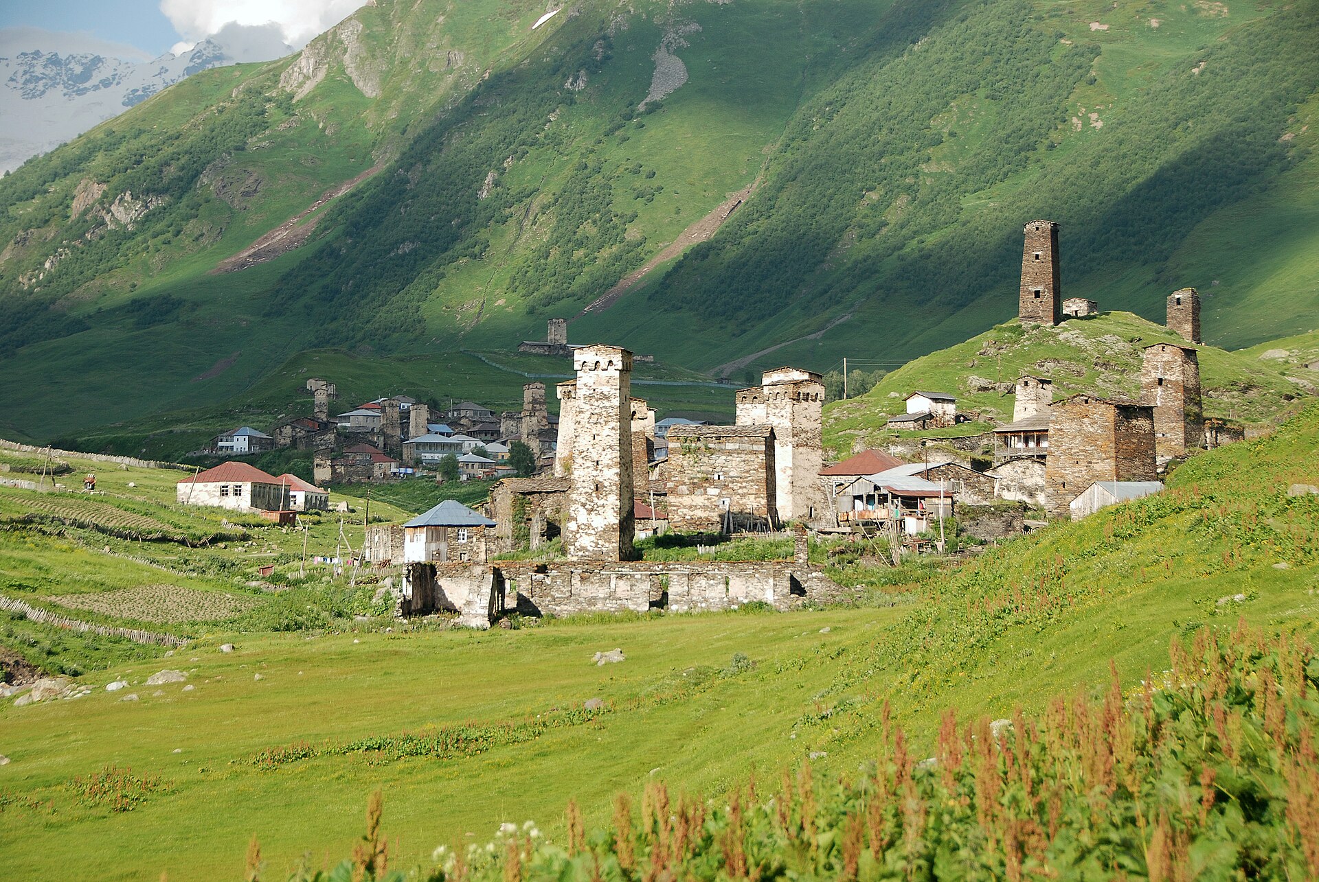 Medieval Svan defensive towers rising above the village of Ushguli, Upper Svaneti, Georgia